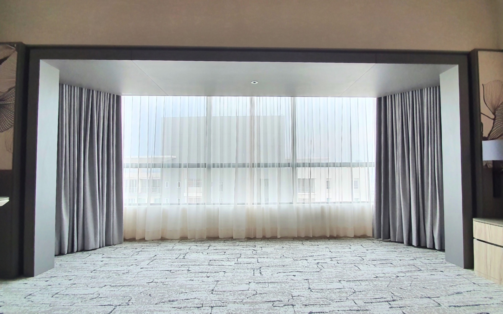 Soft sheer and blackout curtains for a Penang bedroom